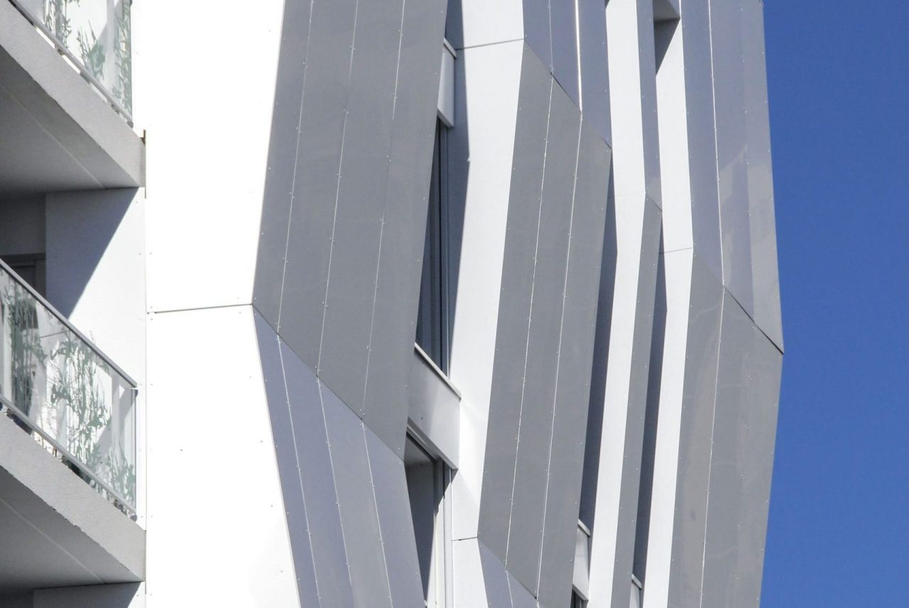 TIM 2 système fixation riveté vissé façade aluminium composite  résidence 245 hall TIM Composites
